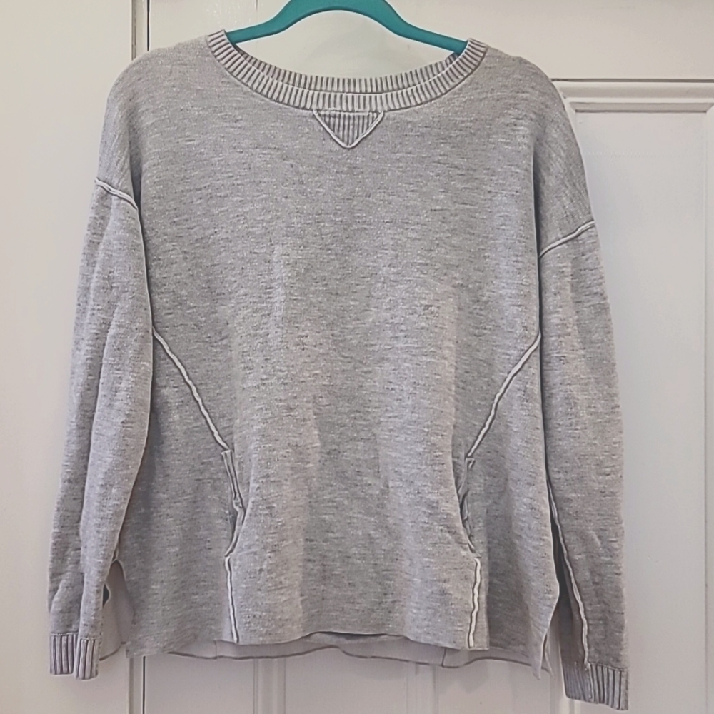 Woman size XL  OST light gray long sleeve shirt with rounded neck and pockets